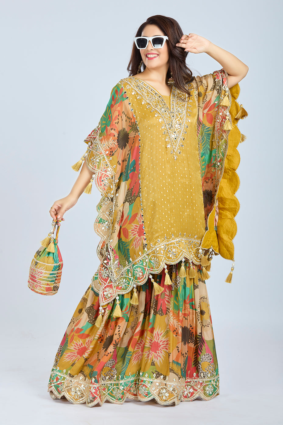 Elegant Mustard Yellow Tissue Banarasi Short Kaftan with Floral Gharara and Potli